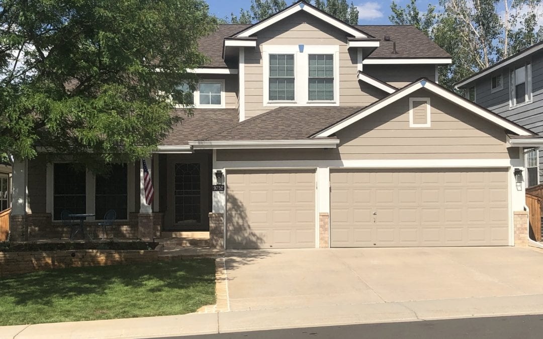 a stunning brown home that we replaced the roof expertly